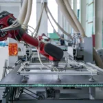 title backer pro waterproof backer board factory robotic arm in operation at production line