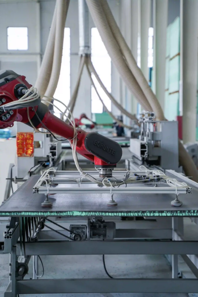 title backer pro waterproof backer board factory robotic arm in operation at production line